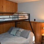 Woodlands Lodging at Ski Brule is tucked in the Northwoods. Peace & quiet, surrounded by trees. Night sky is filled with stars. Your home away from home at Ski Brule. Woodlands Lodging is located in the heart of the Brule Village. Tucked in the Northwoods, you will believe you are the only ones in the forest. Woodlands Lower Duplex is a two bedroom, one bath, sauna, full kitchen and hot tub chalet for up to 5 guests. “I first found Ski Brule in 1978 … boldly took five of my children plus two high school friends to the Upper Peninsula to learn to ski. Everyone had such a great time that we planned a family trip for the next year. Many more in the years that followed and always adding more family each trip. Everyone loved Brule … even those who had skied the ‘Big Mountains’ out West. Why? SO many reason. Great snow and well-groomed trails of course. Great rental equipment, cozy lodge with food service and ski shop, friendly atmosphere, reliable childcare, fantastic instructors, comfortable accommodations. Ski Brule has it all. Something for everyone from the smallest to the ‘go for it’ teenager and everyone in between. The overall costs of staying / skiing at Ski Brule are quite reasonable. Brule is a gem for families with new skiers, young adults and a friendly and helpful staff who go out of their way to make sure that a Ski Brule experience is the best it can possibly be.” ~ Mac